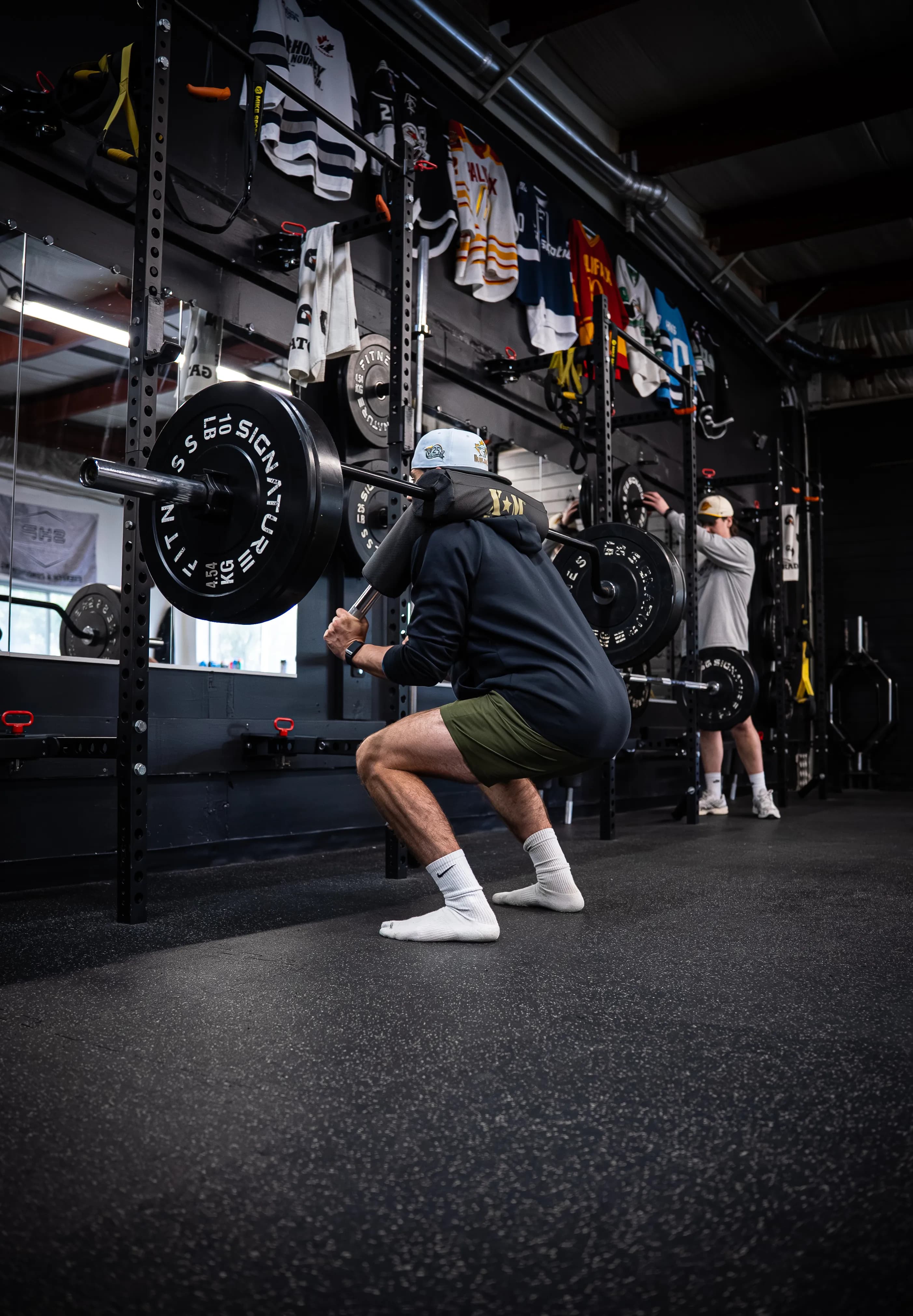 Athlete squatting at Shaw Hockey Performance